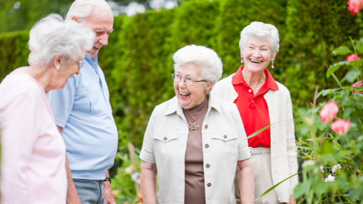 A Senior'S Guide: Why Independent Living In West Union, Ia Is Better Than Living Alone 2 A Group Of Seniors Having A Conversation While Their Walking