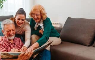 Seniors Reading In Senior Assisted Living Facility