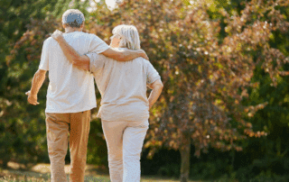Senior Couple Taking A Walk Outside