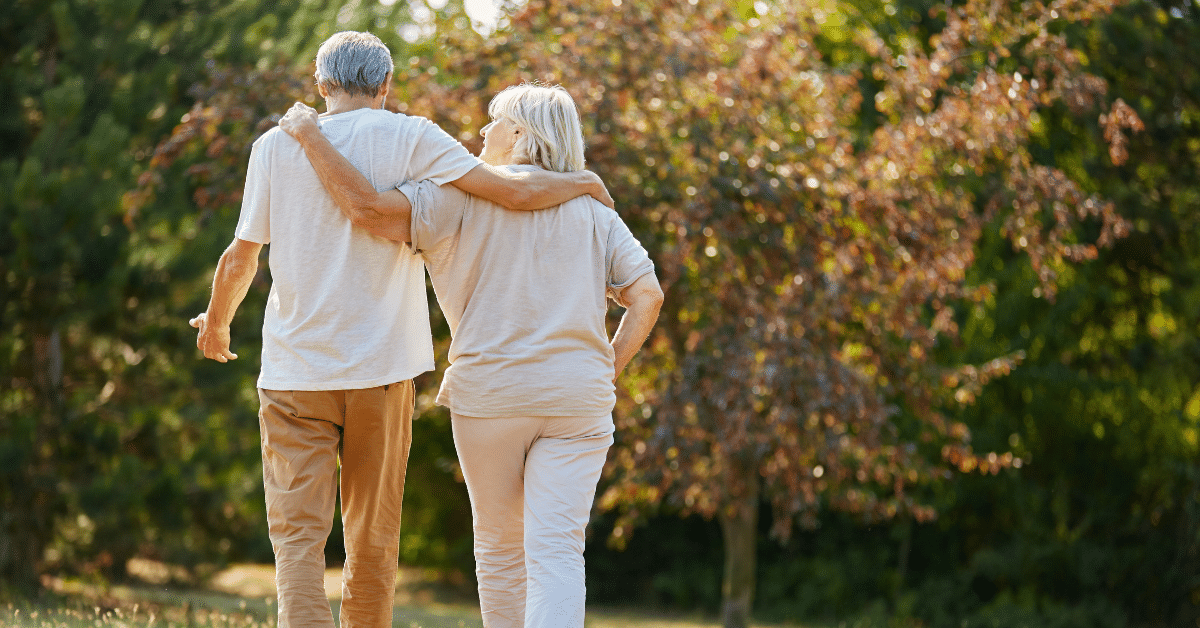 Tips For Easier Outings With Memory Care Needs 3 Senior Couple Taking A Walk Outside