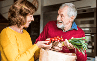 A Senior Couple With Food