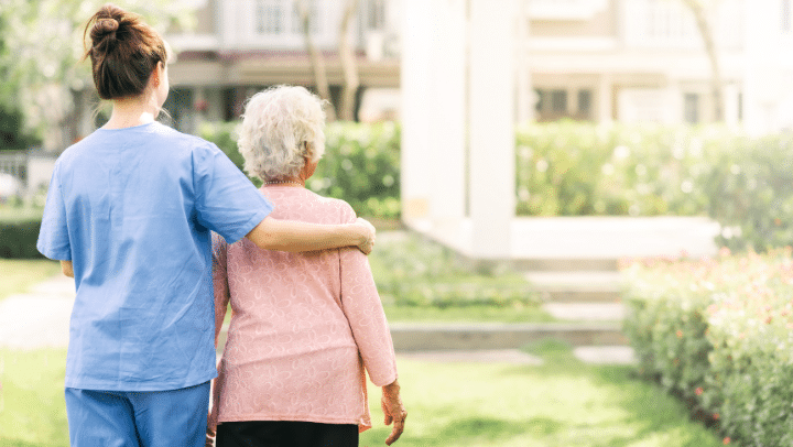 The Hidden Benefits Of Senior Living Community In West Union, Ia 3 A Caregiver Hugging A Senior Lady