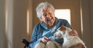 Finding Peace: Pet Therapy In A Dementia Care Community 2 Older Woman And Pet In Dementia Care Community